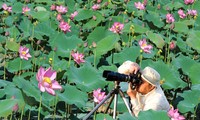 Trần Bíc đang tác nghiệp