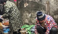 Một hàng bán và giết mổ động vật hoang dã ở chợ Hoa Nam, Vũ Hán. (Ảnh: Simon Song)