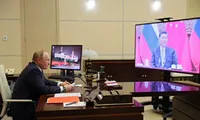 Tổng thống Nga Vladimir Putin trong cuộc gặp trực tuyến Chủ tịch Trung Quốc Tập Cận Bình. (Ảnh: Sputnik)