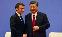 Chủ tịch Trung Quốc Tập Cận Bình và Tổng thống Pháp Emmanuel Macron. (Ảnh: Reuters)