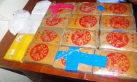 25 bánh heroin phát hiện trôi dạt ở bờ biển Quảng Nam được người dân giao nộp cơ quan chức năng.
