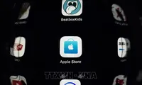 Biểu tượng App Store trên màn hình điện thoại. Ảnh: AFP/TTXVN