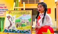 Thiếu nhi Nghệ An làm tranh hạt mừng 50 năm ngày non sông thống nhất 