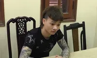 Ngô Bá Khá tại cơ quan công an.