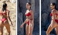 &apos;Mỹ nhân gợi cảm nhất thế giới&apos; khoe body tạc tượng với bikini xẻ hông cao vút