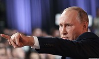 Tổng thống Nga Vladimir Putin tại cuộc họp báo cuối năm ngày 14/12. Ảnh: TASS