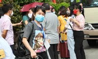 Giảng viên trường ĐH Hà Nội nhận nhiệm vụ làm công tác kiểm tra thi tại tỉnh Phú Thọ. Ảnh Bùi Toàn 