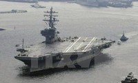 Tàu sân bay USS Ronald Reagan rời căn cứ hải quân Yokosuka gần Tokyo (Nhật Bản) ngày 8/10. (Nguồn: Kyodo/TTXVN)