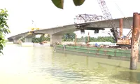 Hình hài cầu bắc qua sông nối Bình Dương và Đồng Nai giai đoạn hợp long