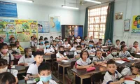 Học sinh Trường Tiểu học Lê Văn Thọ, quận 12, TPHCM trong buổi tựu trường ngày 1/9 