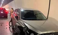 Một phương tiện bị hư hỏng nặng do Dương điều khiển xe con vượt ẩu trong hầm Hải Vân gây nên (ảnh CAND)