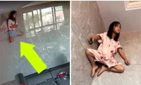 Bé gái 8 tuổi đu trên tường ngồi xem tivi khiến mẹ phát hoảng khi xem lại camera