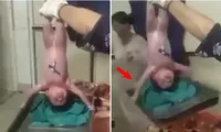 Video em bé &quot;siêu nhân&quot;, vừa ra đời đã nhấc bổng khay kim loại như lực sĩ khiến y tá kinh ngạc