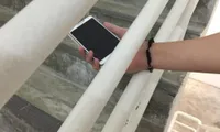 Giảng viên quay video dưới váy nữ sinh