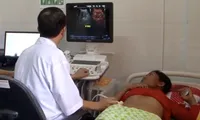 Chăm sóc sức khoẻ sinh sản cho người dân đồng bào dân tộc thiểu số. Ảnh: PV/Vietnam+