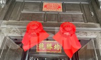 Yếu tố tâm linh sau đôi mắt cửa treo dọc phố cổ Hội An