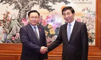 Chủ tịch Quốc hội Vương Đình Huệ hội kiến Chủ tịch Chính hiệp toàn quốc Trung Quốc Vương Hộ Ninh