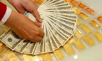 Giá vàng đồng loạt giảm, tỷ giá USD hạ nhiệt