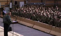 Tổng thống Mỹ Donald Trump phát biểu trong chuyến thăm bất ngờ đến căn cứ al-Asad. Ảnh: Reuters