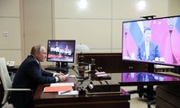 Tổng thống Nga Vladimir Putin và Chủ tịch Trung Quốc Tập Cận Bình. Ảnh: Tass