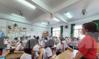 Học sinh TPHCM trong ngày đầu tiên đến trường 13/12