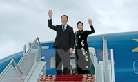 Chủ tịch nước Trần Đại Quang và Phu nhân tại sân bay Quốc tế Minsk. (Ảnh: Nhan Sáng/TTXVN)