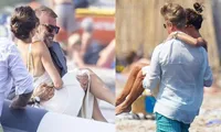 Victoria Beckham lộ nội y gợi cảm, được ông xã bế trên biển
