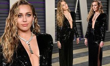 Miley Cyrus diện đầm xẻ sâu hờ hững cùng chồng dự tiệc Oscar