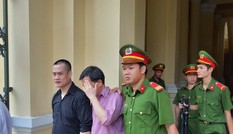 Mang 100 nghìn USD giả đến ngân hàng đổi lấy tiền thật