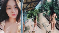 Ca sĩ gây tranh cãi vì mặc bikini bé xíu dắt chó đi dạo ở nhà ga xe lửa