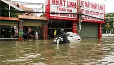 Người dân TPHCM sống chung với ngập nước