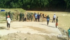 Tìm thấy một cán bộ biên phòng bị lũ cuốn trôi
