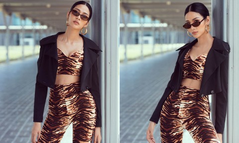 Hoàng Thuỳ diện crop-top 'hổ báo', khoe vòng một gợi cảm và eo thon ở sân bay