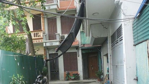 Chưa có cơ sở xem xét tiếp vụ cao ốc ‘mượn’ nhà dân nâng 15 tầng