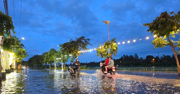 Nước tràn bờ hồ trung tâm Cần Thơ, phố ẩm thực ngập sâu