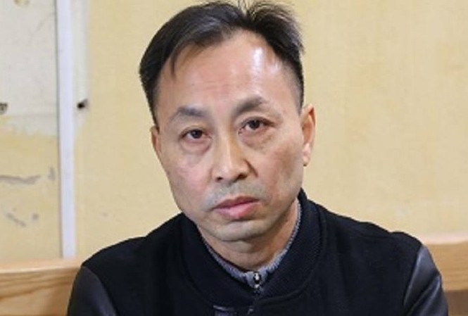 Bắt đối tượng người Trung Quốc trốn nã sang Việt Nam Đối tượng Huang Jian Rong tại cơ quan điều tra. Ảnh: Công an tỉnh Hải Dương.