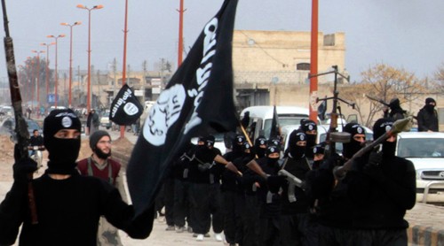 IS tấn công người Kurd bằng khí mù tạt Các phiến quân Nhà nước Hồi giáo. Ảnh: Reuters