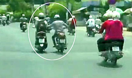 Giật túi xách đựng hàng trăm triệu đồng giữa phố Ảnh minh họa