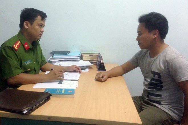 Truy bắt tài xế ôtô tông cảnh sát giao thông Đối tượng Phạm Trung Hiếu tại cơ quan điều tra. Ảnh: Zing