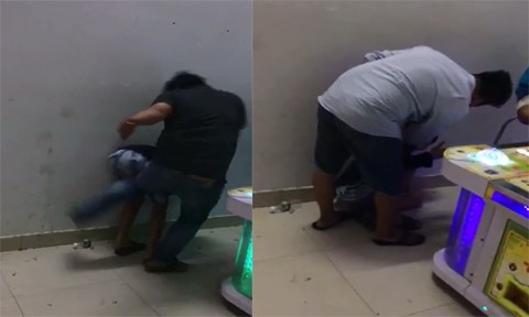 Bé trai 15 tuổi bị đánh, chích điện trong tiệm game Thiếu niên bị đánh dã man. Ảnh cắt từ clip