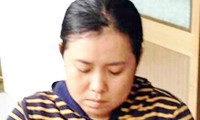 Thảo bị nạn nhân bí mật ghi hình khi nhận tiền. Ảnh: Công an cung cấp
