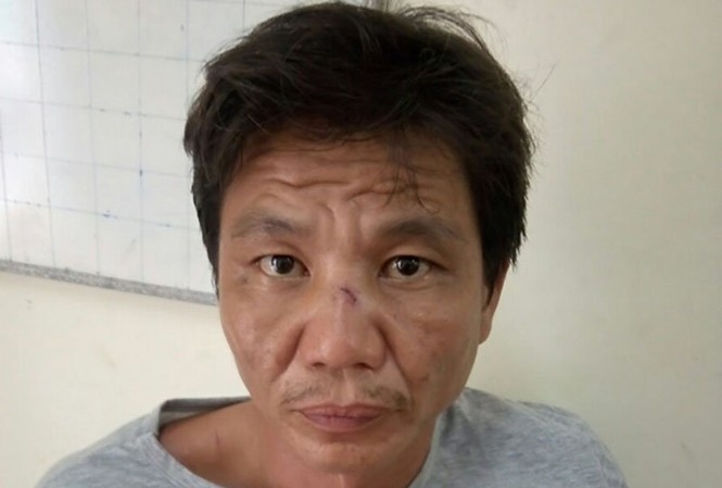 Người đàn ông đâm chết bạn trai của vợ cũ vì ghen Lê Văn Tấn tại cơ quan điều tra. Ảnh: Công an cung cấp