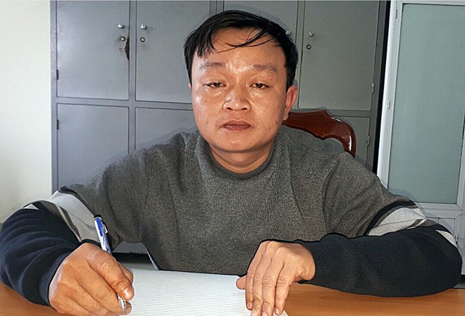 Gã trai bóp cổ, cướp tiền bà cụ 81 tuổi ngay tại nhà Nguyễn Đình Thương tại cơ quan điều tra. Ảnh: C.A.