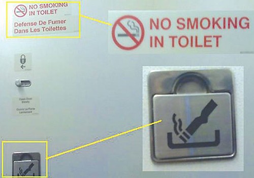 Nữ sinh hút thuốc trong toilet máy bay bị phạt 2 triệu đồng Dòng chữ cảnh bảo hút thuôc trên máy bay