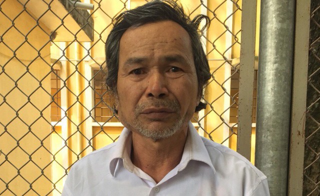 Người đàn ông dùng vồ đánh chết em trai và hàng xóm Đối tượng Dương Minh Sơn tại cơ quan công an