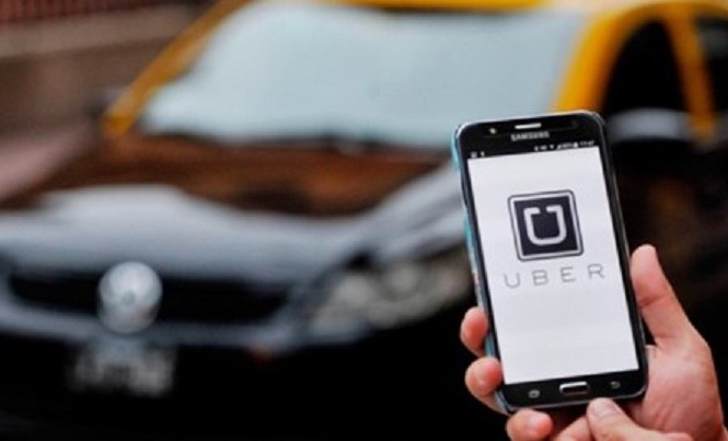 Uber đồng ý nộp gần 70 tỷ đồng truy thu thuế nhưng dọa kiện Uber dọa kiện Cục thuế TPHCM. Ảnh minh họa