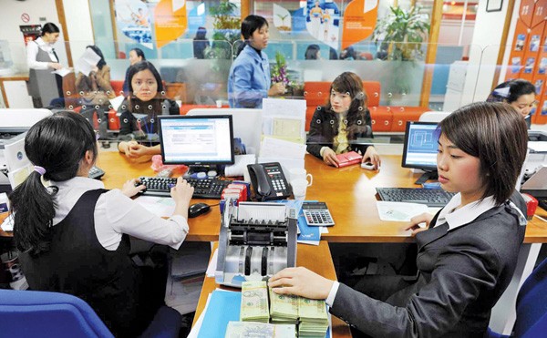 Thêm 'cửa' xử lý ngân hàng Tăng tỷ lệ sở hữu cho nhà đầu tư nước ngoài. Ảnh: Hồng Vĩnh