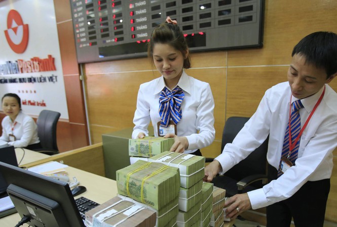 Lãi suất không giảm nữa Ngân hàng chật vật tăng tín dụng. Ảnh: Như Ý
