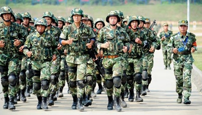 Trung Quốc có thể điều 100.000 quân chống khủng bố tới Tân Cương Lính Trung Quốc diễn tập chống khủng bố tại Quảng Đông ngày 24/9. Ảnh: CNS