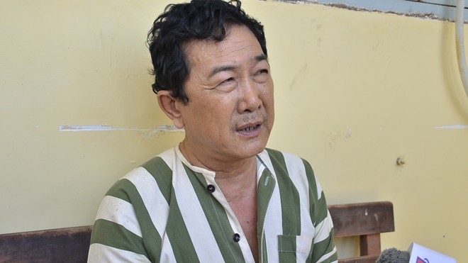 Bắt đối tượng lừa đảo bằng điện thoại chiếm đoạt hơn 1 tỷ đồng Nghi can Ngoan tại cơ quan điều tra. Ảnh Việt Văn